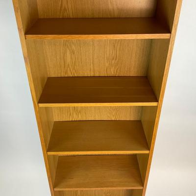 Sale Photo Thumbnail #1307: Has some scratches on side of shelf. Adjustable peg shelves
Measures: 6'7" high x 23.5" wide x 11" deep