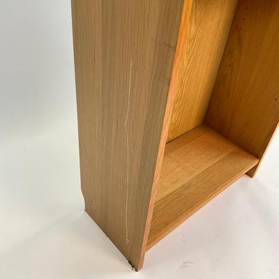 Sale Photo Thumbnail #1308: Has some scratches on side of shelf. Adjustable peg shelves
Measures: 6'7" high x 23.5" wide x 11" deep