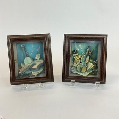 Sale Photo Thumbnail #1326: Framed behind glass, one with banjo art inside glass is more foggy
Both measure: 6.5" wide x 7.5" high