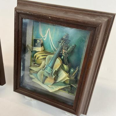 Sale Photo Thumbnail #1330: Framed behind glass, one with banjo art inside glass is more foggy
Both measure: 6.5" wide x 7.5" high