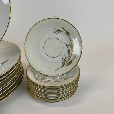 Sale Photo Thumbnail #1344: Big and small oval platter, seven dessert plates, sugar plate, nine dinner plates ten salad plates, nine saucers, two large soup bowls. One bowl is chipped