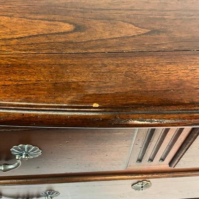 Sale Photo Thumbnail #1381: Has one small chip on front, scalloped hardware, oak wood
Measures: 48" wide x 20" deep x 36" high