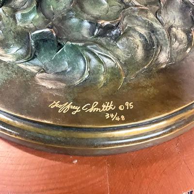 Sale Photo Thumbnail #1396: Against the Wind is an elegant rendition of a pair of mallards cutting through the wind for a landing .  The design incorporates beautiful "S" curves and circular motion rising out of an integrated formal bronze base.  This piece is suitable for indoor, o
