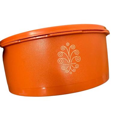 Sale Photo Thumbnail #463: Tupperware Lot of 3 Plus 2 Vtg Mugs
-large orange Tupperware container with sunburst lid, 70s design
-2 mustard yellow Tupperware one cup containers with hinged lids
-two matching retro mugs w/ blue base marked Bopp-Decker Plastics Inc, Birmingham Mich., 