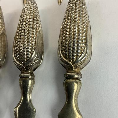 Sale Photo Thumbnail #1465: Corn holders weighted