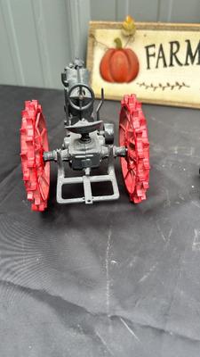DIE CAST FARMALL TRACTOR, TWO CAST IRON MODEL A TRUCKS AND WALL HANGING