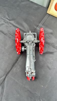 DIE CAST FARMALL TRACTOR, TWO CAST IRON MODEL A TRUCKS AND WALL HANGING