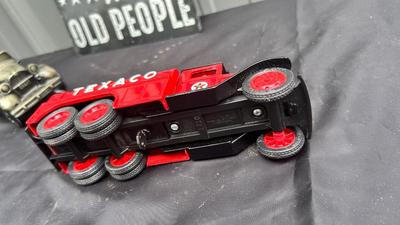 TIN SIGN, TEXACO DIE CAST BANK AND RUBBER MODEL T BANK