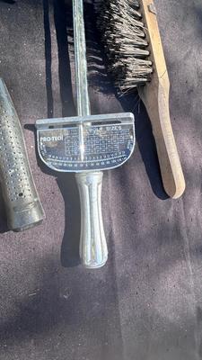 HATCHET, HAMMER, TORQUE WRENCH, SANDER, AND A WIRE BRUSH