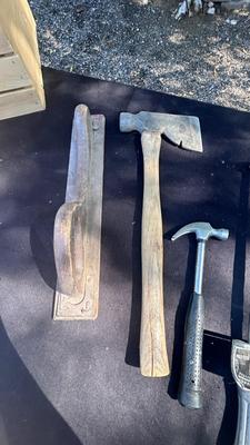 HATCHET, HAMMER, TORQUE WRENCH, SANDER, AND A WIRE BRUSH