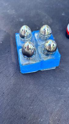 VINTAGE SALT AND PEPPER SHAKERS, TOOTHPICK HOLDERS, AND TIN SIGN
