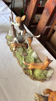 THE FOX AND THE HOUNDS