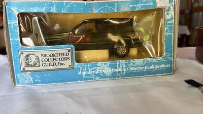 DERRINGER GUN TABLE LIGHTER, DIE-CAST JEEP GRAND CHEROKEE AND SNOWMOBILE AVON BOTTLE
