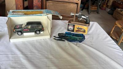 DERRINGER GUN TABLE LIGHTER, DIE-CAST JEEP GRAND CHEROKEE AND SNOWMOBILE AVON BOTTLE