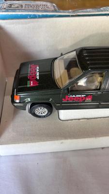 DERRINGER GUN TABLE LIGHTER, DIE-CAST JEEP GRAND CHEROKEE AND SNOWMOBILE AVON BOTTLE