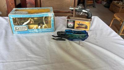 DERRINGER GUN TABLE LIGHTER, DIE-CAST JEEP GRAND CHEROKEE AND SNOWMOBILE AVON BOTTLE