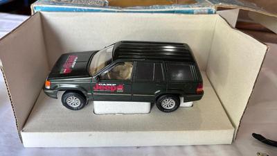 DERRINGER GUN TABLE LIGHTER, DIE-CAST JEEP GRAND CHEROKEE AND SNOWMOBILE AVON BOTTLE