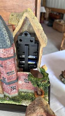 HOUSE CLOCK, PORCELAIN RABBITS, BEARS AND WOODEN ELEPHANT