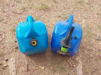 TWO 5 GALLON KEROSENE JUGS