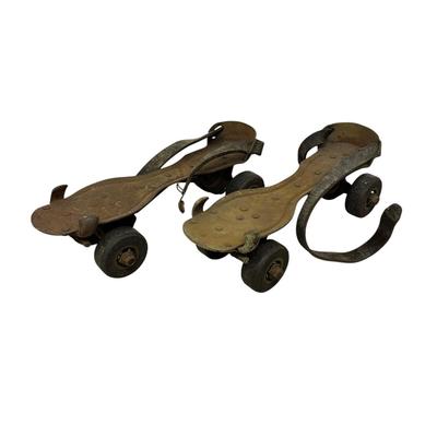 Sale Photo Thumbnail #540: Vintage Adjustable Metal Roller Skates w Leather Straps and Hard Composite Wheels, early 20th Century, patent date Nov. 27, 1917. Visible rust, wear, and aging.