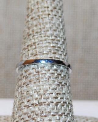 Size 7 Small Oval Red Center Stone Ring with Full "Diamond" Shaped Surround on a Silver Tone Band (2.5g)