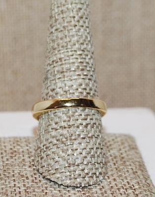 Size 9 Half Infinity Ring with Center Row of 8 Clear Stones on a "Grooved" Gold Tone Setting (5.3g)