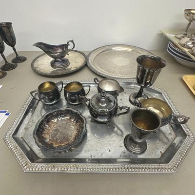 Sale Photo Thumbnail #614: Lot of Silverplated Trays, Cups, Gravy Boat, Etc.