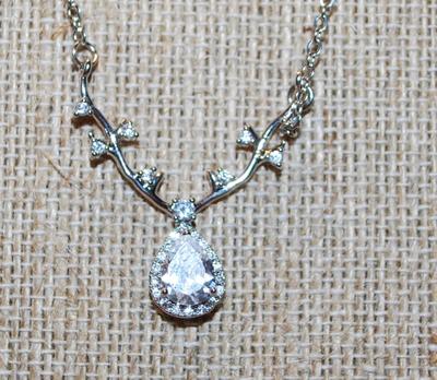 Pear Shaped Clear Stone on a "Branch" with 9 Tiny Stone Accents PENDANT (1" x 1") on a Silver Tone Necklace Chain...
