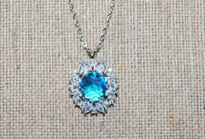 Large Oval Blue Stone PENDANT (1" x ¾") with Full Bright Surrounds on a Silver Tone Necklace Chain 17" L
