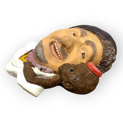 Sale Photo Thumbnail #729: Ceramic Organ Grinder Face with Monkey, approx. 8" 
no branding, no idea of age, there is a place to hang on back