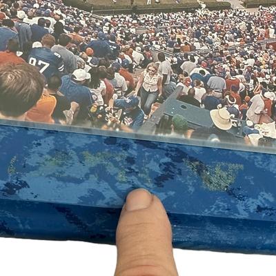 Sale Photo Thumbnail #764: Florida Gators Framed Official 2008 Stadium Game Plaque
"officially licensed collegiate product" 
Photo File 2008 
Missing title shield on bottom- you can see where glue residue was left.