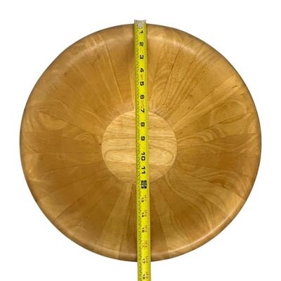 Sale Photo Thumbnail #767: 1993 Rubberwood Huge Wooden Bowl Made in Malaysia; "Plantation Timber, Environmentally Friendly"
17" in diameter across the top! Excellent condition.