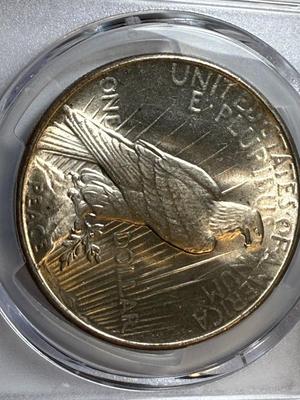 PCGS CERTIFIED 1935-P MS63 PEACE SILVER DOLLAR BETTER DATE AS PICTURED.