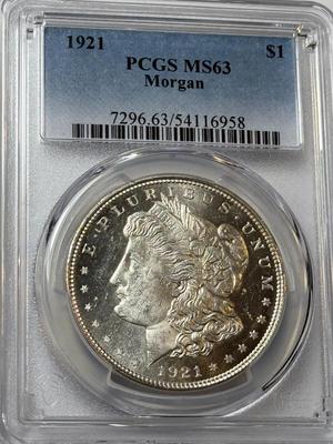 PCGS CERTIFIED 1921-P MS63 MORGAN SILVER DOLLAR W/PROOF LIKE SURFACES AS PICTURED.
