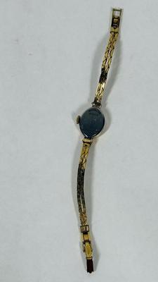 Sale Photo Thumbnail #61: Model 875479.  1980s Hamilton 1/20 10k gold filled Marquise case Ladies Watch. Very good condition. Gold Filled Double Rope Bracelet. Manual winder, watch is running.