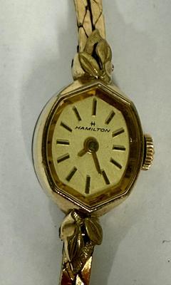 Sale Photo Thumbnail #59: Model 875479.  1980s Hamilton 1/20 10k gold filled Marquise case Ladies Watch. Very good condition. Gold Filled Double Rope Bracelet. Manual winder, watch is running.