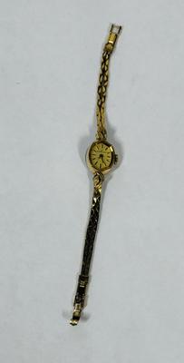 Sale Photo Thumbnail #62: Model 875479.  1980s Hamilton 1/20 10k gold filled Marquise case Ladies Watch. Very good condition. Gold Filled Double Rope Bracelet. Manual winder, watch is running.