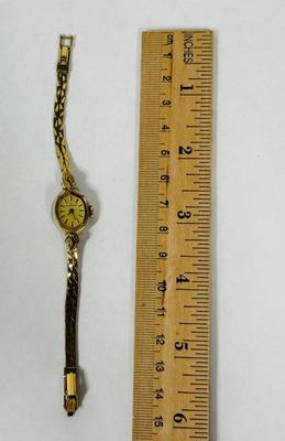 Sale Photo Thumbnail #58: Model 875479.  1980s Hamilton 1/20 10k gold filled Marquise case Ladies Watch. Very good condition. Gold Filled Double Rope Bracelet. Manual winder, watch is running.