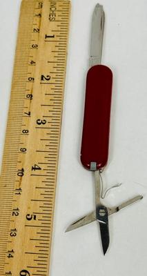 Sale Photo Thumbnail #1: Tools include knife blade, nail file, scissors and pull-out toothpick.  Very good used condition.