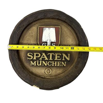 Sale Photo Thumbnail #855: Vintage Spaten Munchen Man Cave Bar Decor Wall Hanging- a bit nicked with one chunk missing as shown in photo.