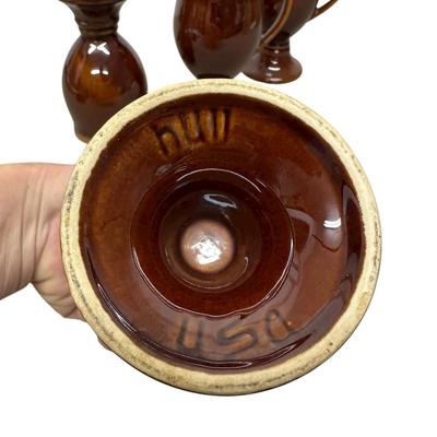 Sale Photo Thumbnail #920: 4 Hull Pottery Tall Brown Stemmed Mugs - one has chip on base as shown in photo
