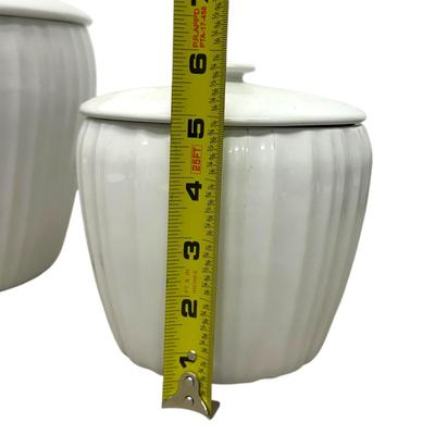 Sale Photo Thumbnail #968: 2 Matching Corning White Jars with Lids- no chips - 6' and 8" tall with lids on