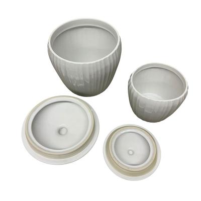Sale Photo Thumbnail #969: 2 Matching Corning White Jars with Lids- no chips - 6' and 8" tall with lids on