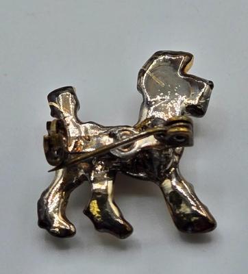 LOT 90: Sterling Silver Jewelry Including Bangle Bracelet with Matching Ring, Chain, and Poodle Pin /21.6 gtw