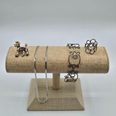 LOT 90: Sterling Silver Jewelry Including Bangle Bracelet with Matching Ring, Chain, and Poodle Pin /21.6 gtw