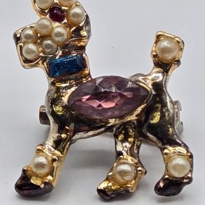LOT 90: Sterling Silver Jewelry Including Bangle Bracelet with Matching Ring, Chain, and Poodle Pin /21.6 gtw