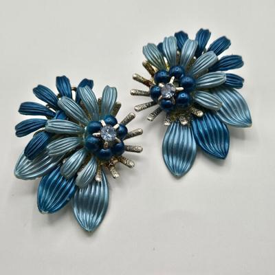 LOT 93: Multiple Pairs of Clip Earrings, Brooches, Silver-tone Chain with Winter Charms, and More