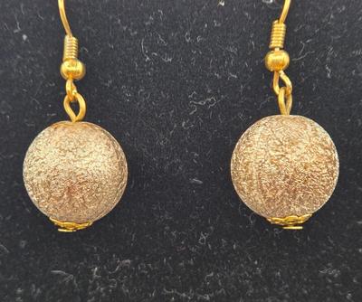 LOT 99: Multiple Gold-tone Necklaces and Chains and Pair of Earrings