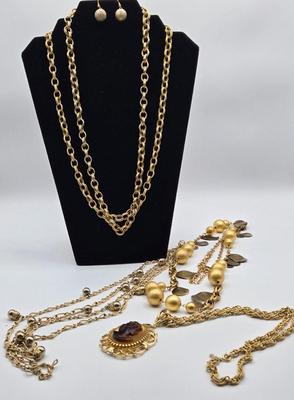 LOT 99: Multiple Gold-tone Necklaces and Chains and Pair of Earrings
