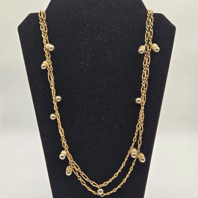 LOT 99: Multiple Gold-tone Necklaces and Chains and Pair of Earrings